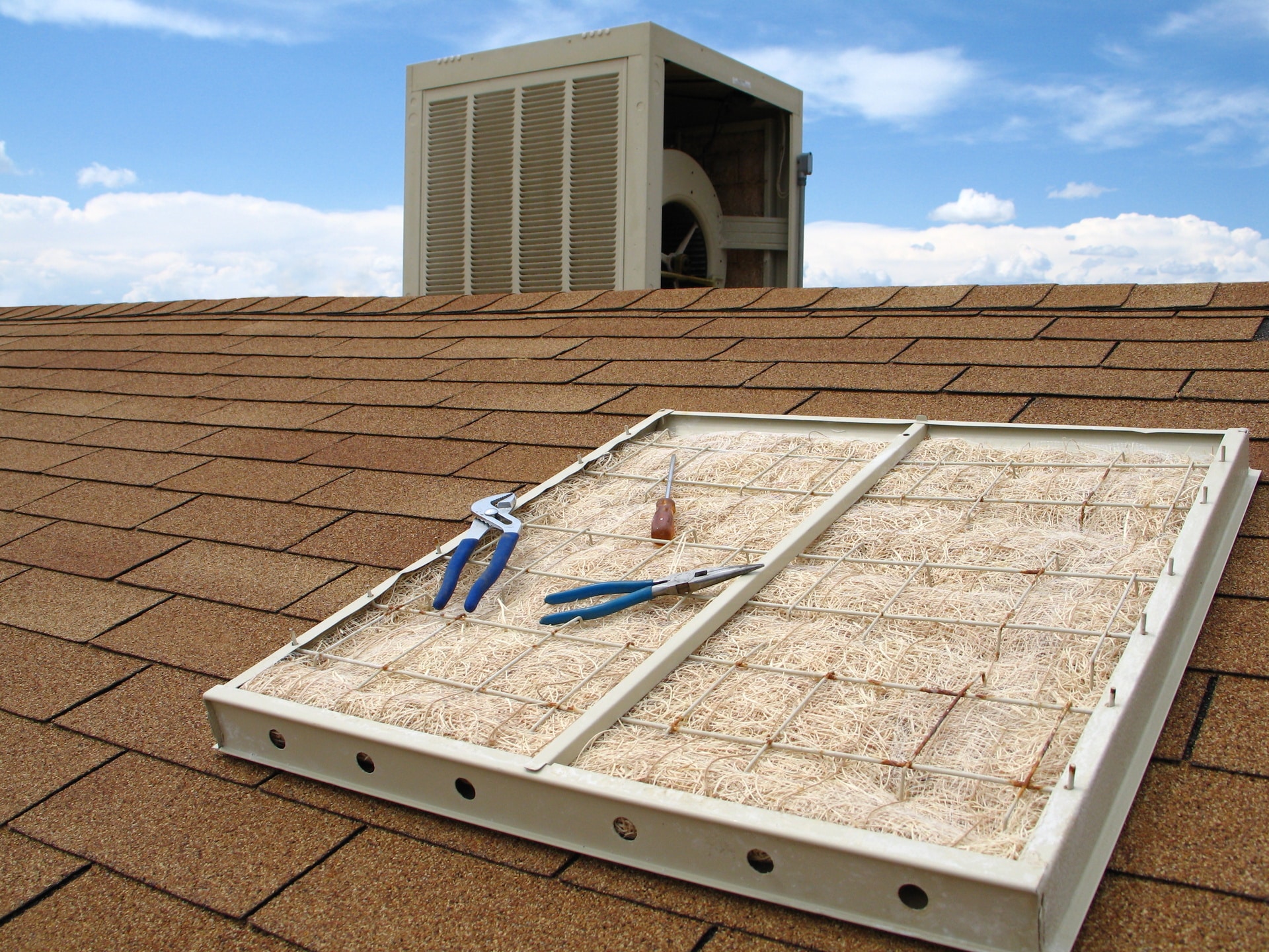 swamp-cooler-maintenance-shingled-roof